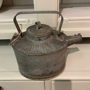 Antique embossed water can