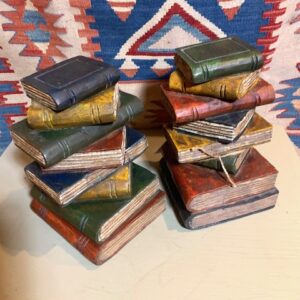Vintage pair of bookends as carved wood painted stack of books