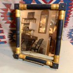 Diminutive Federal black and gold mirror