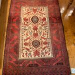 Vintage Persian Baluch rug made by nomadic tribesman