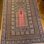 Anatolian prayer rug created by nomadic tribesman from Turkey.