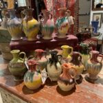 colorful rainbow glazed pottery honey jugs made by North Carolinian Cole potters