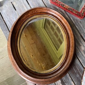 Antique oval walnut mirrors